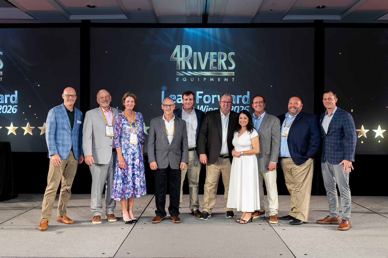 4Rivers Equipment leadership accepting the 2026 Onyx Circle award at the trophy ceremony.